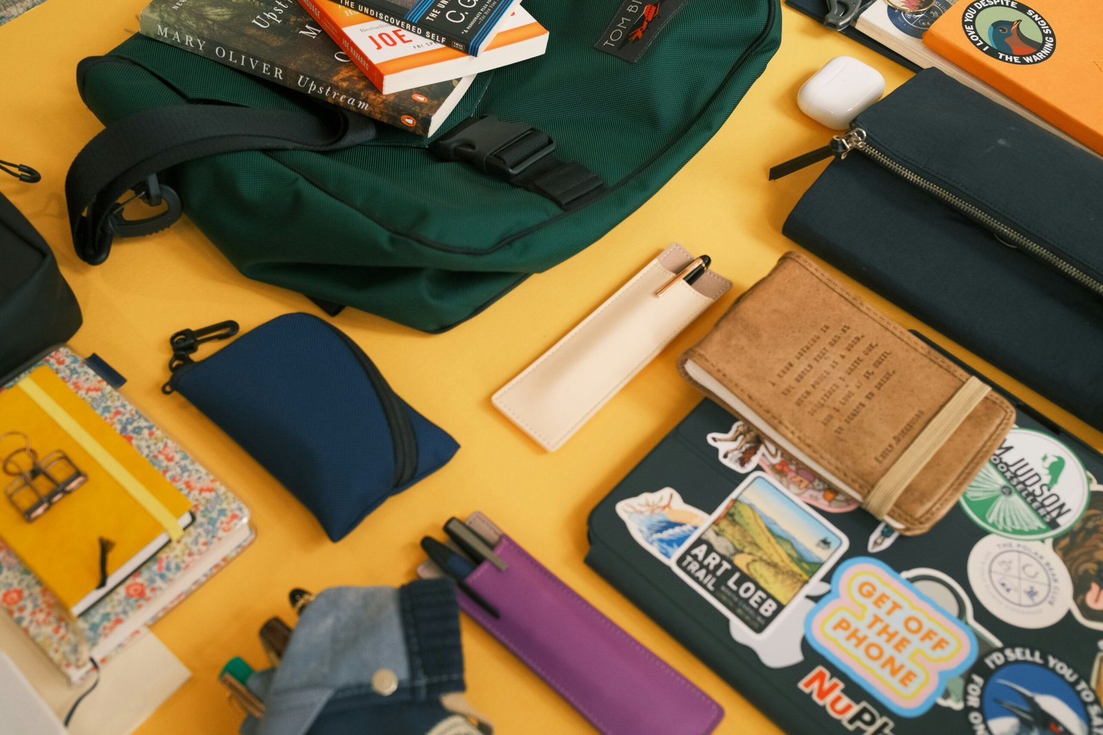 A person frantically searching through their bag for a misplaced metal credit card.