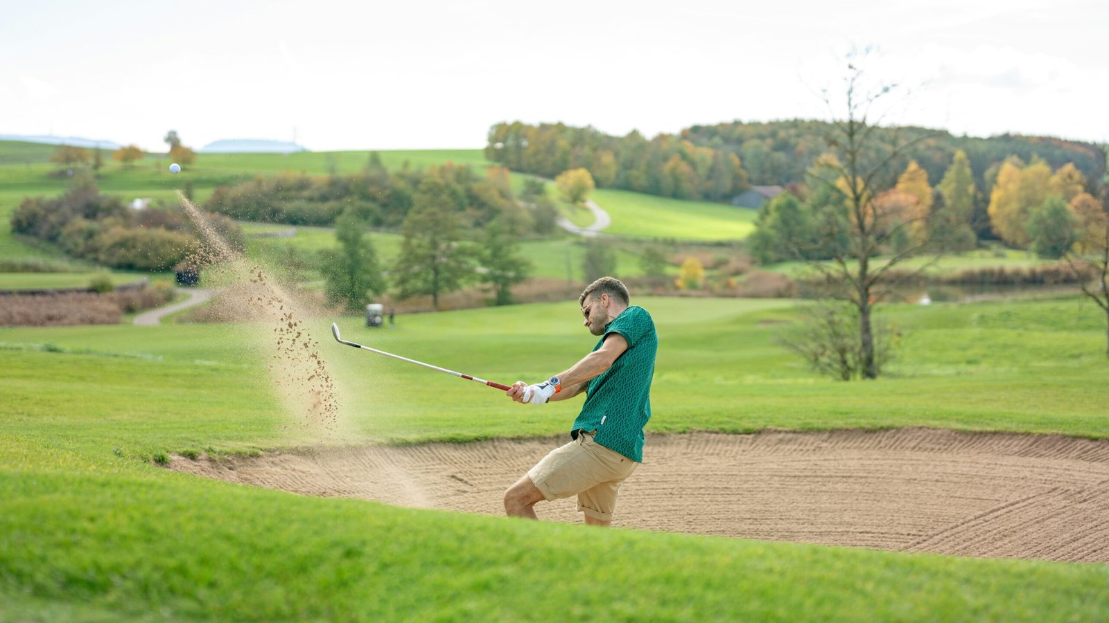 A private golf course surrounded by lush greenery
