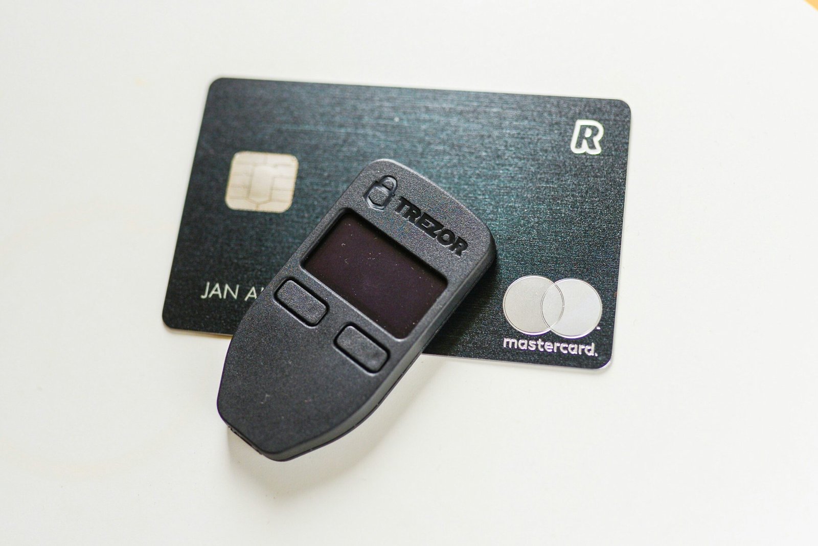 Close-up image of a metal credit card with a chip