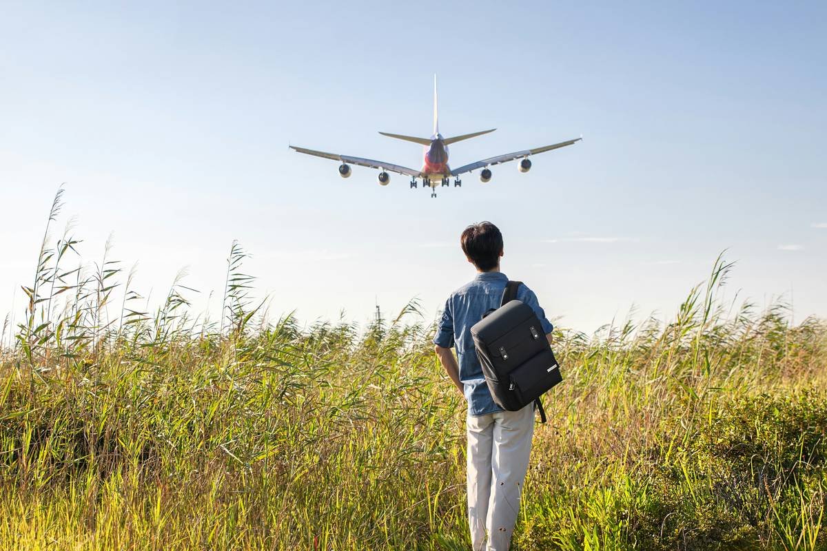 Metal Credit Card on Wooden Surface with Reward Stats Infographic