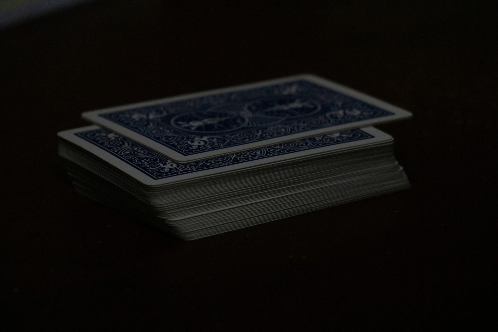 A stack of cards sitting on top of a table